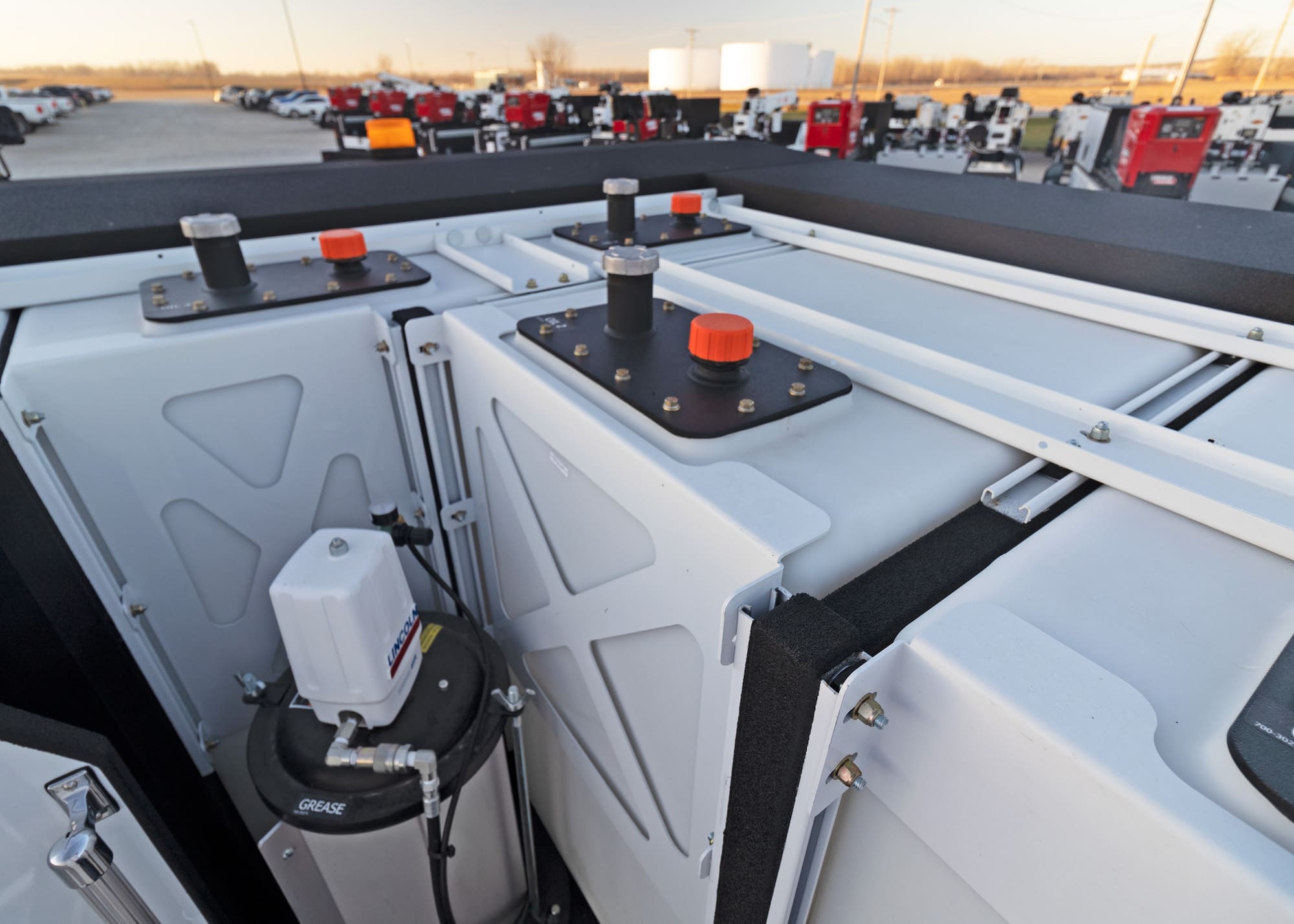 open lube truck body cargo area access to fill product tanks